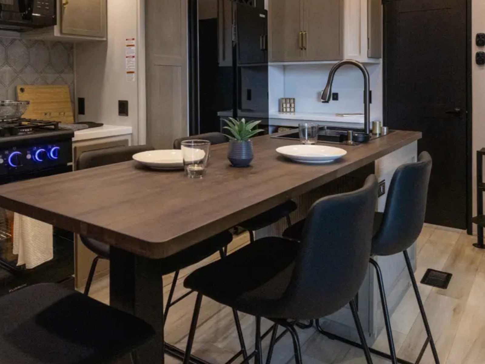 Dining table seating four beside the kitchen