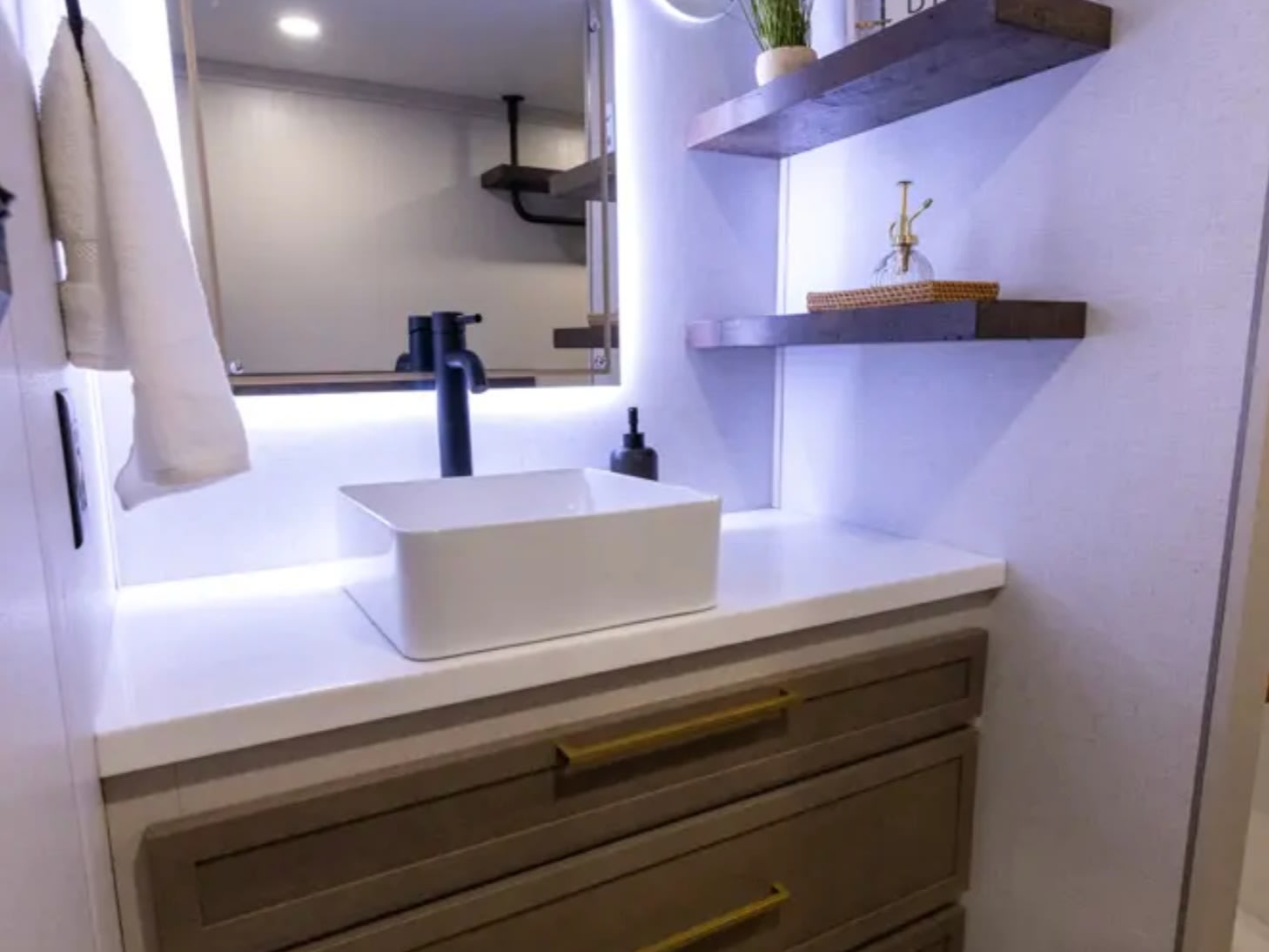 Bathroom vanity with vessel sink and open shelving