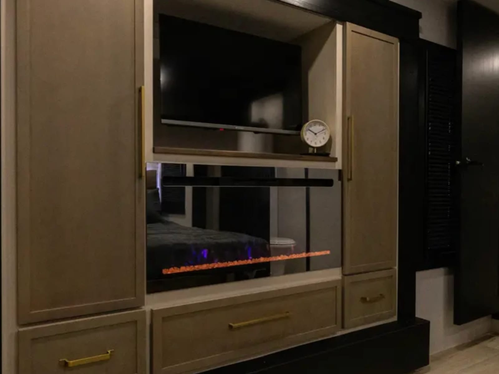Fireplace built into the bedroom cabinetry